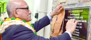 President MajorGeneral (Ret’d) Jioji Konrote unveils the plaque at the newly opened Fiji Commerce and Employers Federation and Fiji Hotel and Tourism Association building at Gorrie Street in Suva yesterday. Photo: DEPTFO