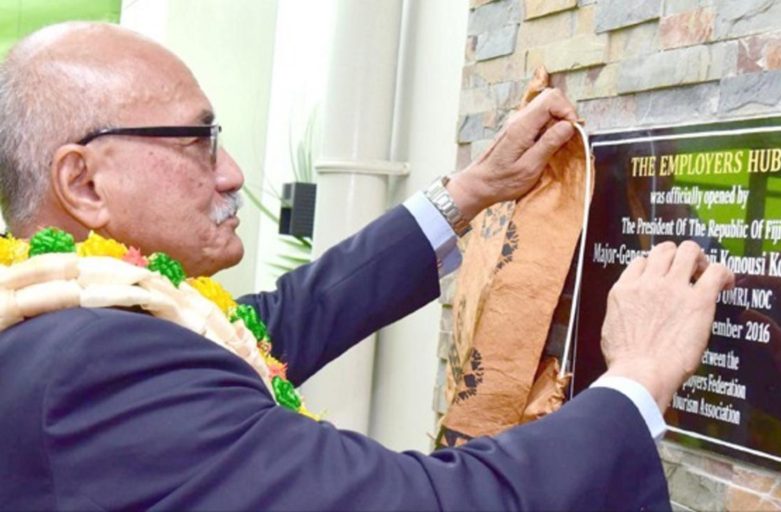 President MajorGeneral (Ret’d) Jioji Konrote unveils the plaque at the newly opened Fiji Commerce and Employers Federation and Fiji Hotel and Tourism Association building at Gorrie Street in Suva yesterday. Photo: DEPTFO