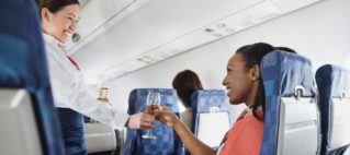 What Law Applies when travelling between two countries on a plane?