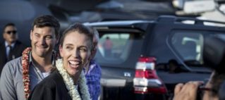 In New Zealand, shopping, parties and big hugs mark start of ‘COVID-free’ life