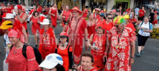 2018 Bula Fiji Interhash participants all in red throughout Lautoka City