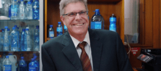 Pleass Global Limited presents cheque to Rotary Pacific Water for Life Foundation